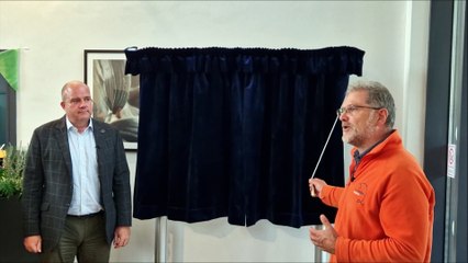 Guests celebrate housing development's new community hub near St Catherine's Hospice in Pease Pottage