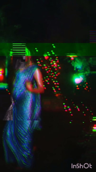 Sexy Indian girl in wet saree dancing in rain