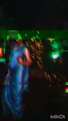 Sexy Indian girl in wet saree dancing in rain