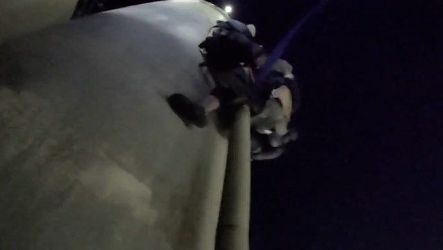 Burglar stuck on tower rescued by police after assaulting officers