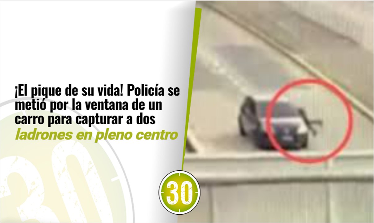 ¡El pique de su vida! Policía se metió por la ventana de un carro para capturar a dos ladrones en pleno centro