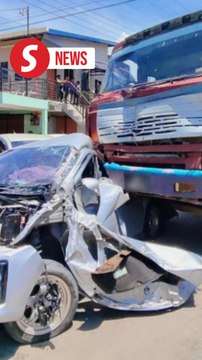 Runaway lorry crashes outside school in Sabah, father narrowly saves child