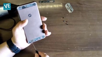 How  Do i open Back Cover Santin Actoma Ace