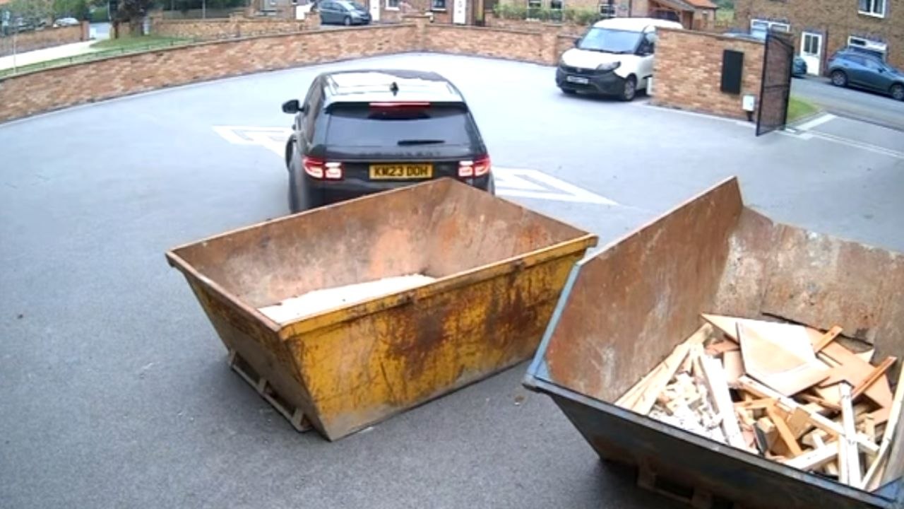 Driver’s attempt at reversing ends with an unexpected collision with an empty skip