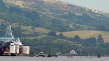 New Royal Navy Type 26 warship HMS Cardiff floating down the River Clyde