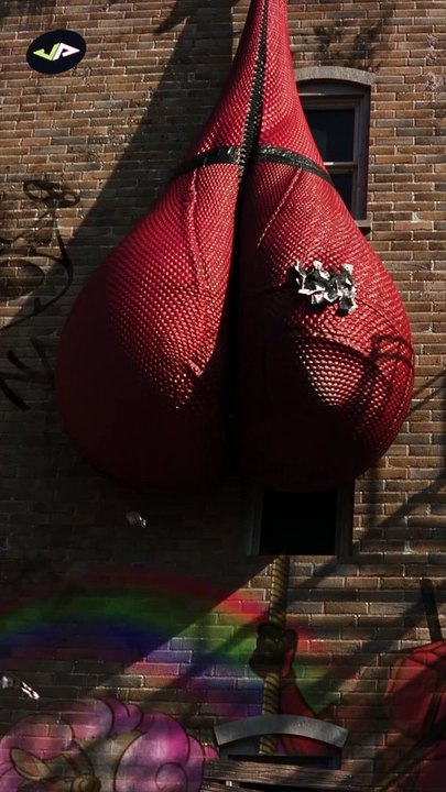 Deadpool hanging something