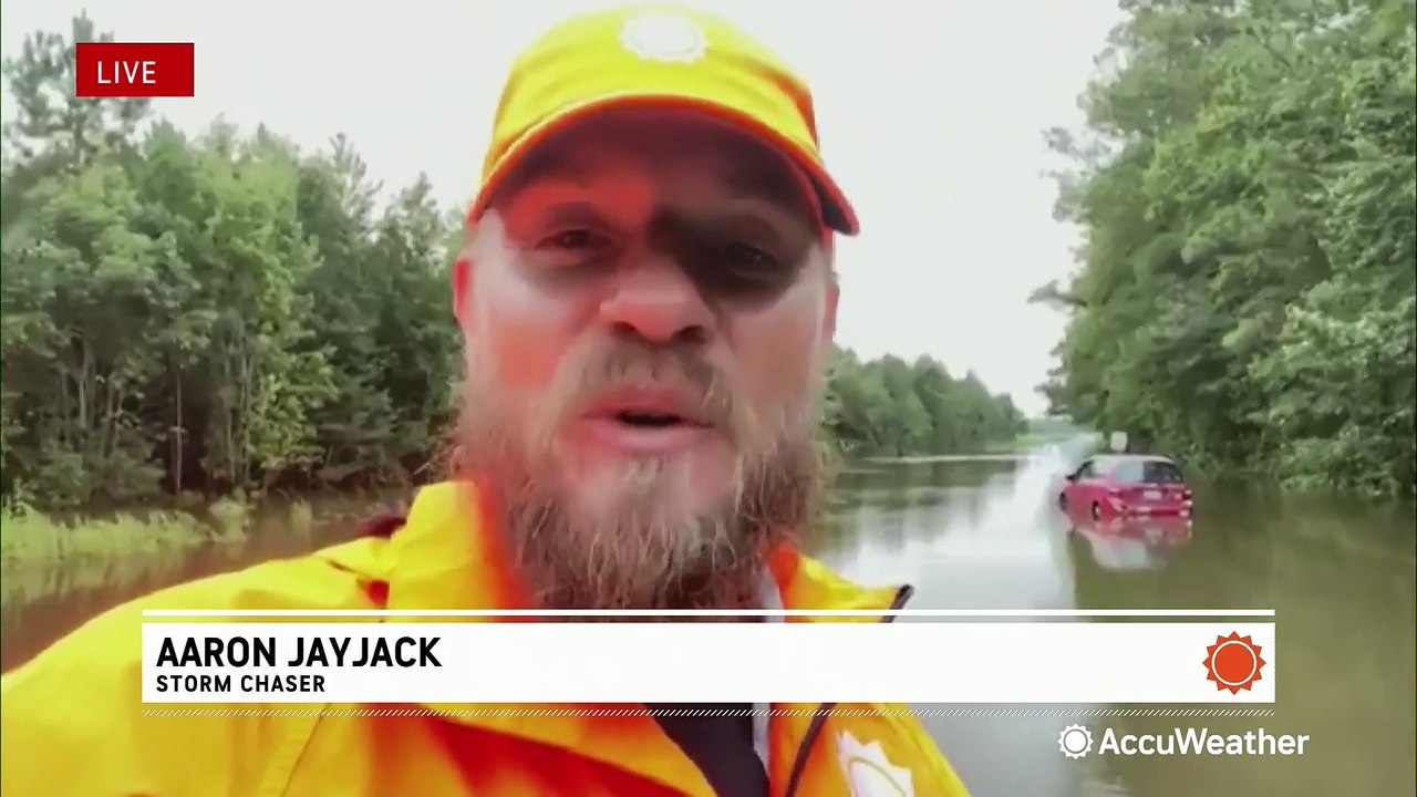 Vehicles stranded in deep floodwaters across multiple North Carolina towns