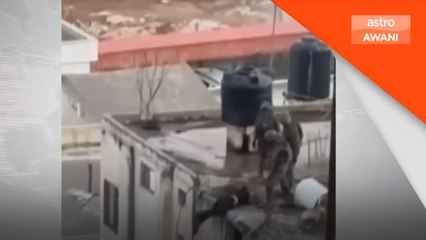 Mayat penduduk Palestin dicampak dari atap rumah