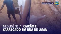 Rua sem asfalto vira lama e moradores carregam caixão a pé em São Joaquim de Bicas