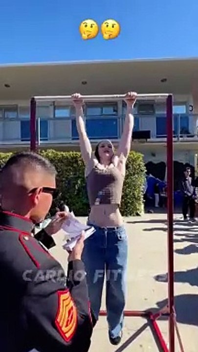 Cute Girl Doing Pull-Ups Exercise