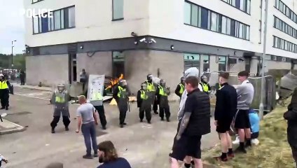 Thug takes two-year-old son to Rotherham race riot