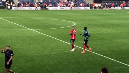 Carlton Morris applauds the Luton supporters