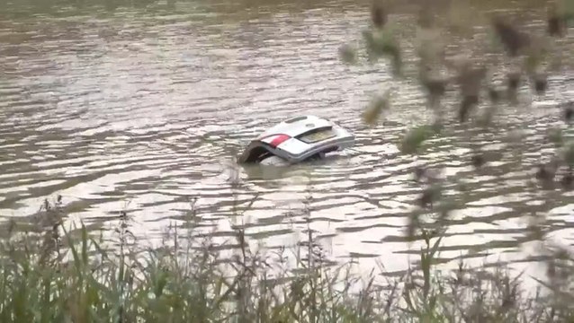 Video: Car completely swamped by floods as dual carriageway submerged in water