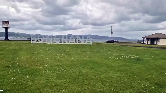 A blustery Shore Front and the 'Buncrana' sign in Buncrana, Co. Donegal