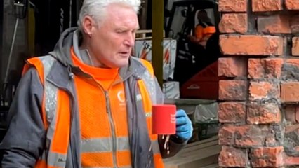 Old man's unorthodox sneezing technique leaves a mark on the workplace