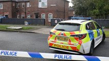 Floral tributes laid by house where mum and girl, 8, found dead