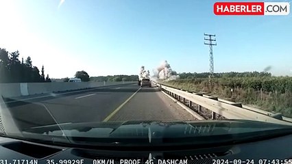 Hizbullah'ın İsrail'e fırlattığı füzenin otoyola düştüğü anlar kameraya yansıdı