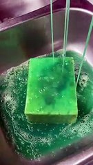 Person does a Sponge Squeezing ASMR with cleaning products!