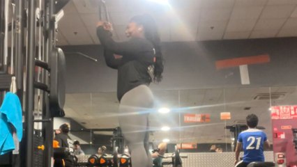 Funny moment: Man blocks camera while girl records her workout set