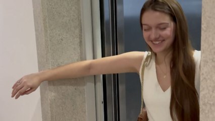 Woman overcome with delight after being surprised with a chihuahua on anniversary