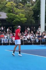 Fritz practicing in Tokyo with a one handed backhand