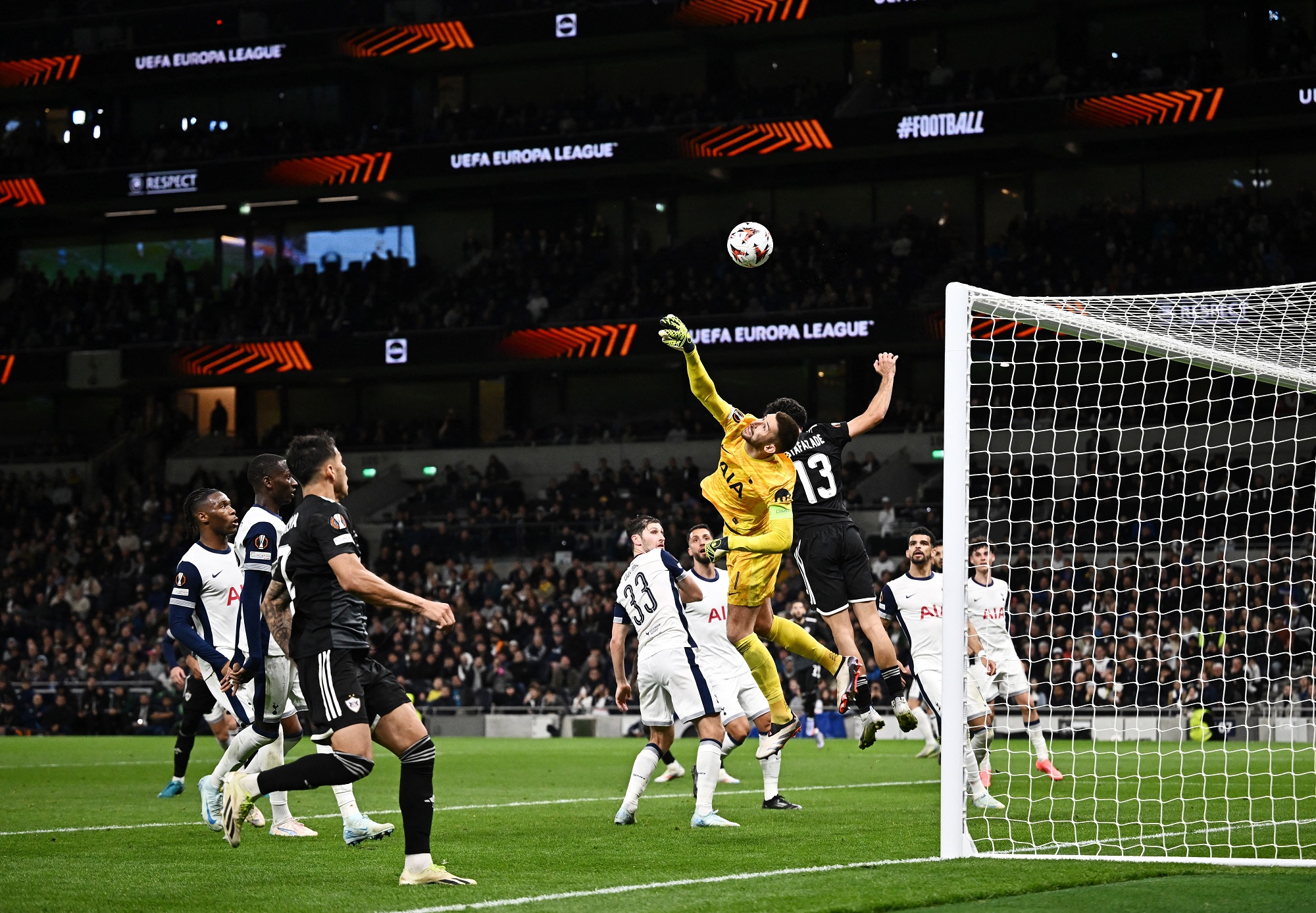 Ten-man Spurs cruise in Europa League opener despite Son injury scare