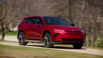 2025 Toyota Crown Signia Limited Finish Line Red Driving in the city