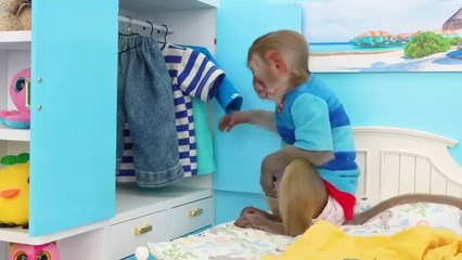 Monkey baby bon bon meet rain of chocolate candy and eats rainbow