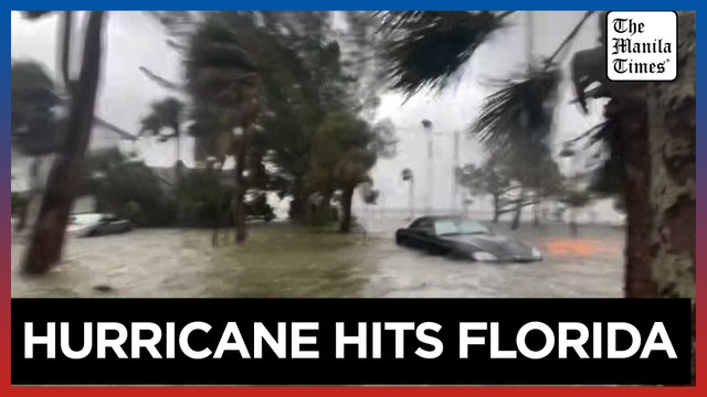Cars, trees and houses submerged after floods caused by Hurricane Helene in Florida