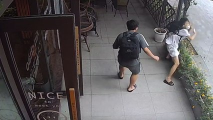 Unexpected collision with uber-clean glass window makes coffee-shop trip memorable for friends