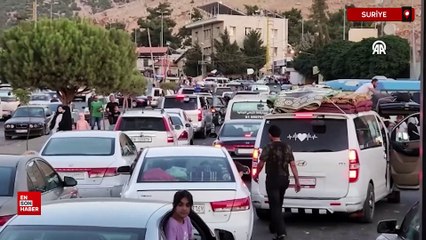 Lübnan'dan kaçan binlerce kişi Suriye'ye geldi