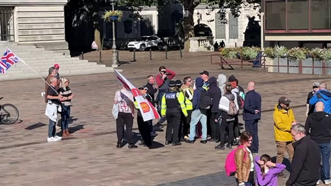 Police engage with protesters at Guildhall