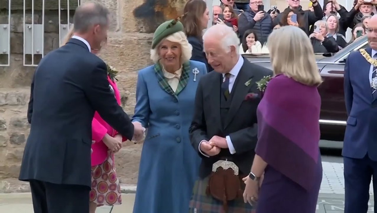 King and Queen arrive at Holyrood in tartan to mark 25 years of Scottish Parliament