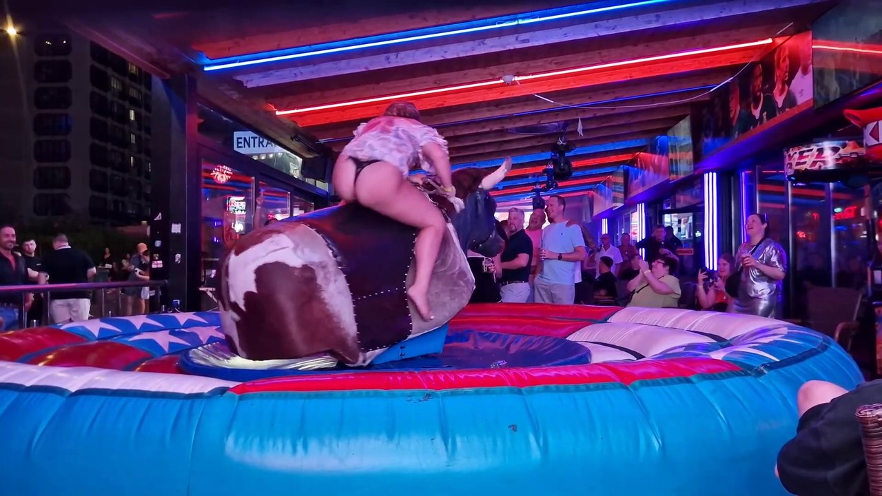 MUST-SEE:  Pretty Girl Ride Mechanical Bull in Benidorm  . EPIC FAIL - SPAIN 2024