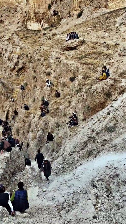 The setting for a volleyball game somewhere in Afghanistan