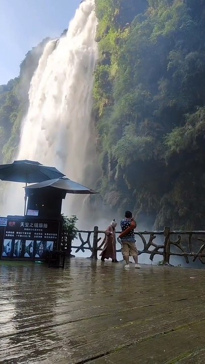waterfall under rocks