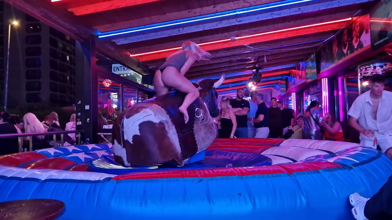 Benidorm Bull Ride Fail: Pretty Girl On Mechanical Bull. SPAIN 2024