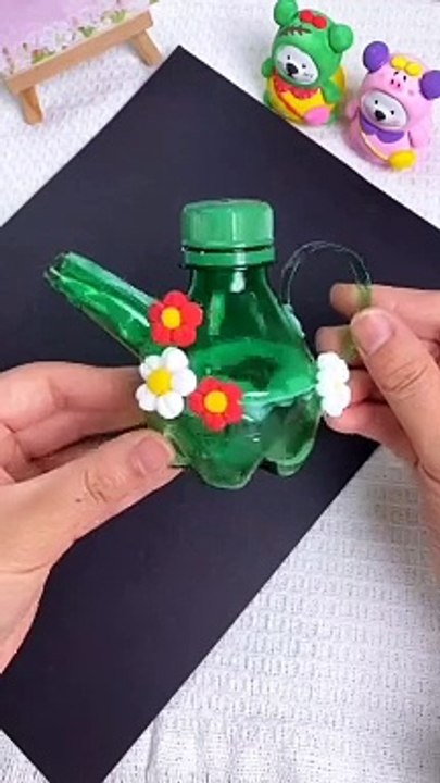 Learn how to make a cute little kettle from a plastic bottle!