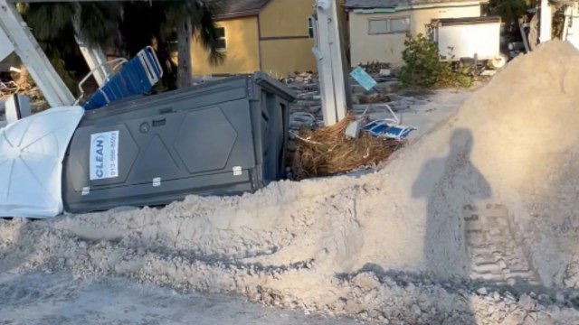 Sunset Beach residents burdened with massive sand cleanup after Hurricane Helene floods the area