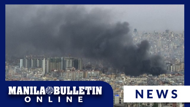 Huge plumes of smoke billow above Beirut's skyline following overnight Israeli strikes