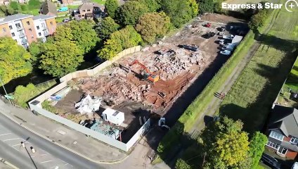 Aerial footage showing the demolition of the former Anchor Inn pub, off Chester Road, Brownhills.