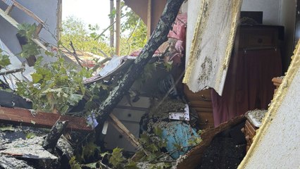 Grandmother's bedroom destroyed by Hurricane Helene - leaving only Bible untouched