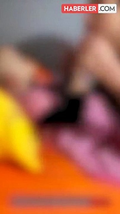 Bebeği dudağından öpüp kaydetti, görüntüyü izleyenler ikiye bölündü