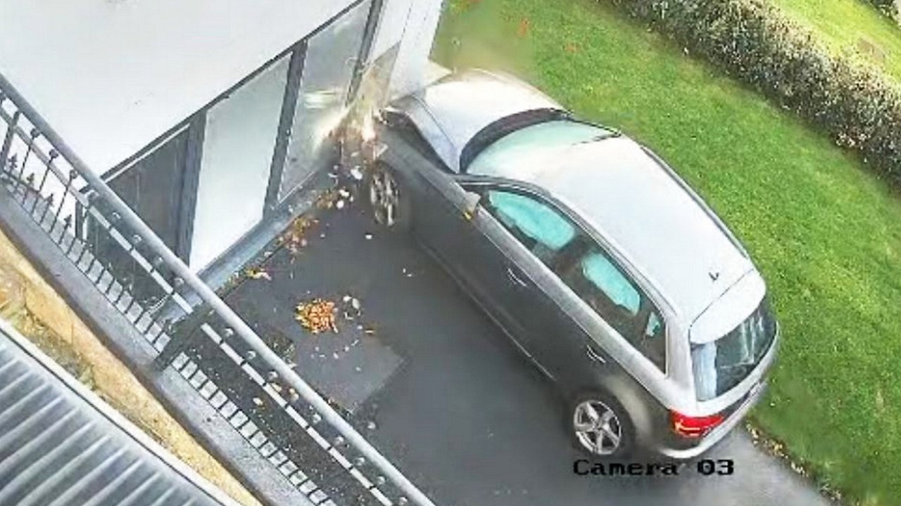 Car smashes into home - while doing a U-turn