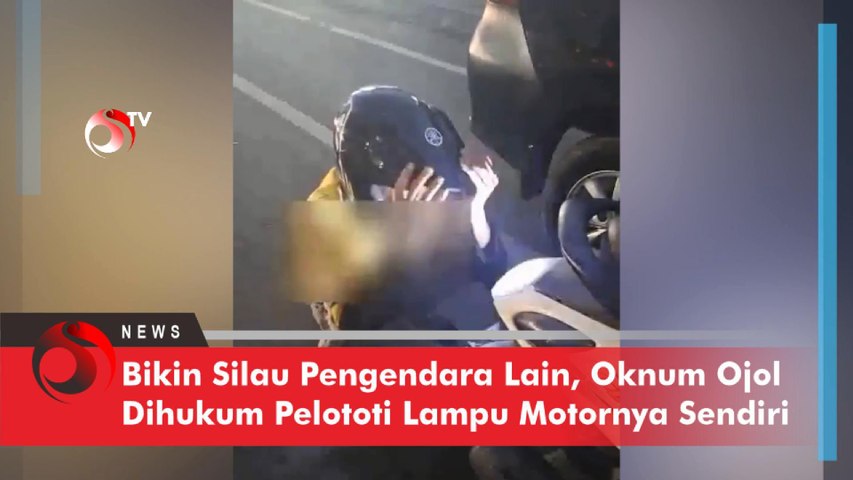 Bikin Silau Pengendara Lain, Oknum Ojol Dihukum Pelototi Lampu Motornya Sendiri