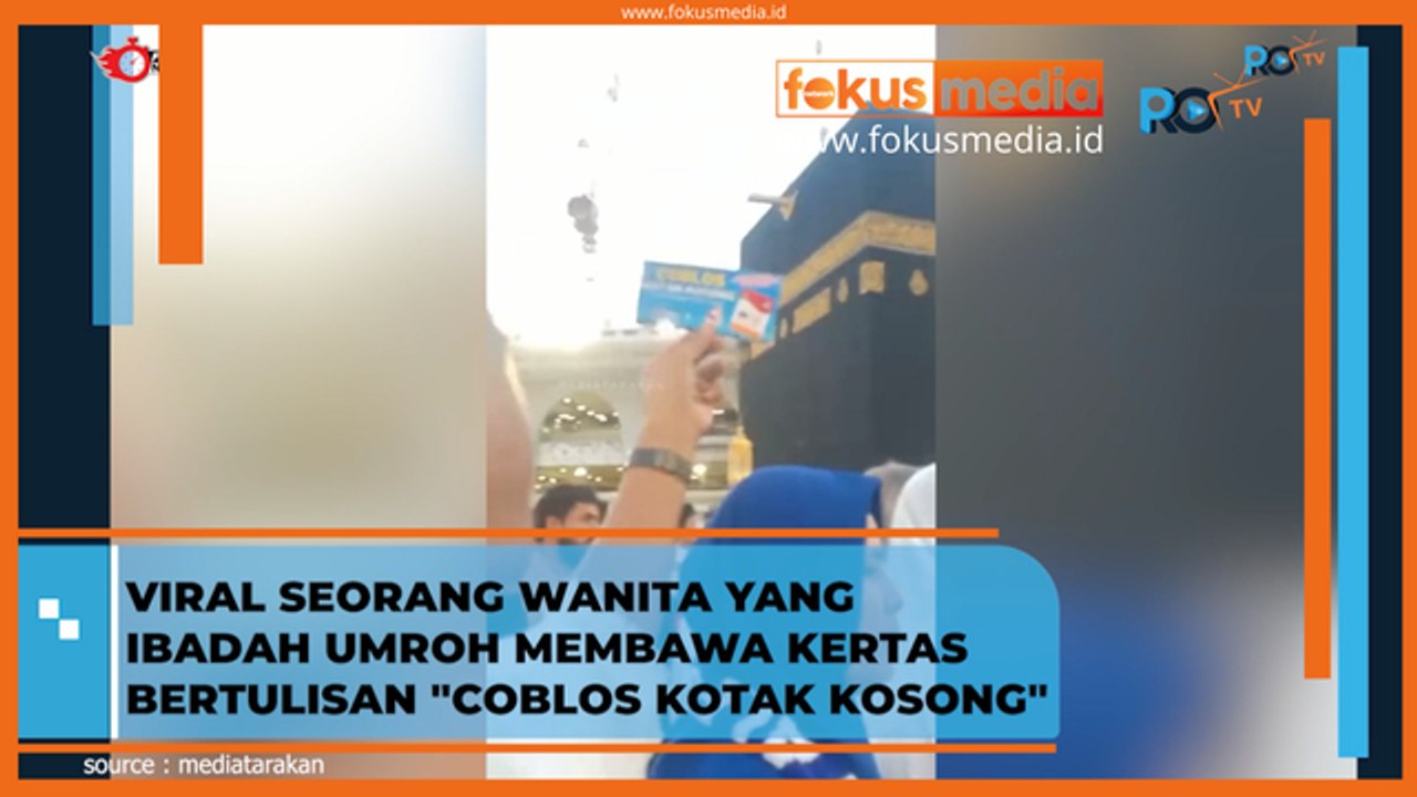 VIRAL!! Seorang Wanita Ibadah Umroh Membawa Kertas Bertuliskan 'Coblos Kotak Kosong'
