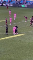 Lionel Messi's bodyguard races to intercept selfie-seeking fan. Messi obliges before fan escorted off