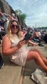 Woman sneaks her own drinks into the races in an umbrella flask!