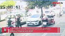 Ticari taksinin çarptığı motosikletlinin asfalt zemine düşme anları kamerada
