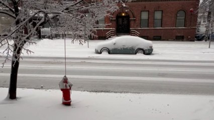 'Snowstorm Dominoes' - Car collision causes light pole chaos